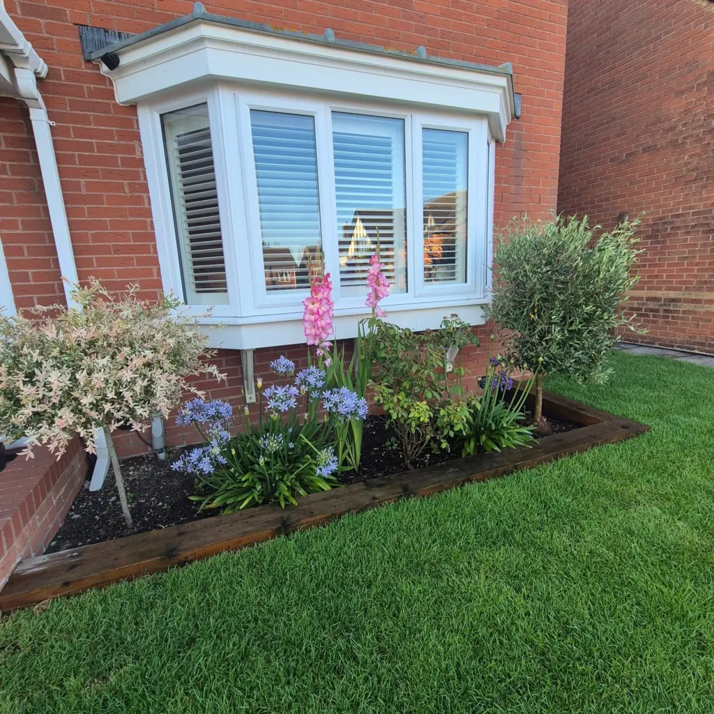 fresh-grass-flower-bed-installed-driveway-restoration-vale-of-glamorgan